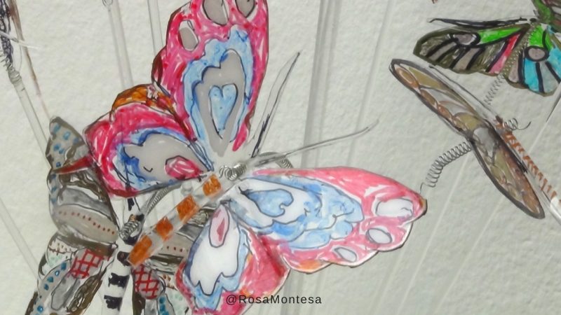 Mariposas pintadas a mano con botellas de plástico