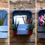 Cajas de fresas de madera recicladas y convertidas en estantes decorativos