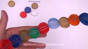 Árbol con tapitas de botellas de plástico #recicladocreativo