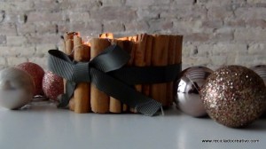 Portavelas con ramitas de canela, reciclando latas de atún