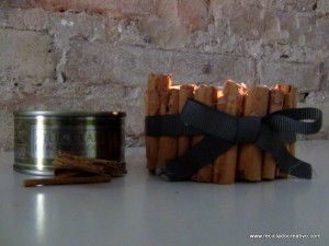 Portavelas con ramitas de canela, reciclando latas de atún