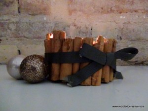 Portavelas con ramitas de canela, reciclando latas de atún